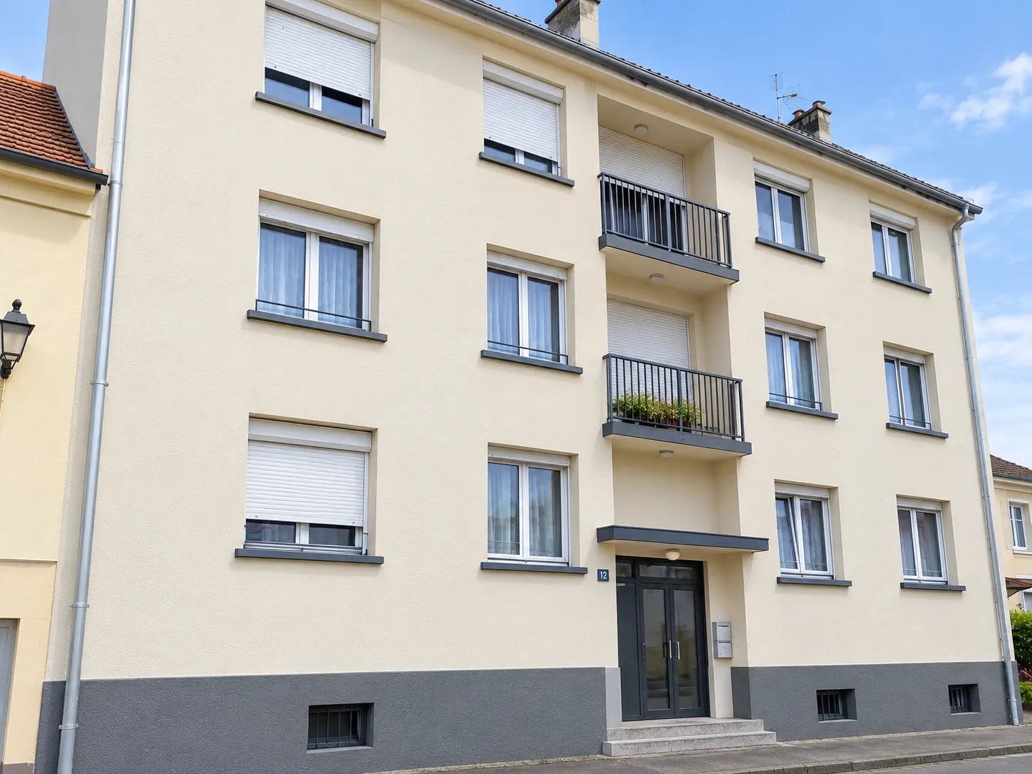 Ravalement d'une façade d'immeuble : après travaux BT QUALIT
